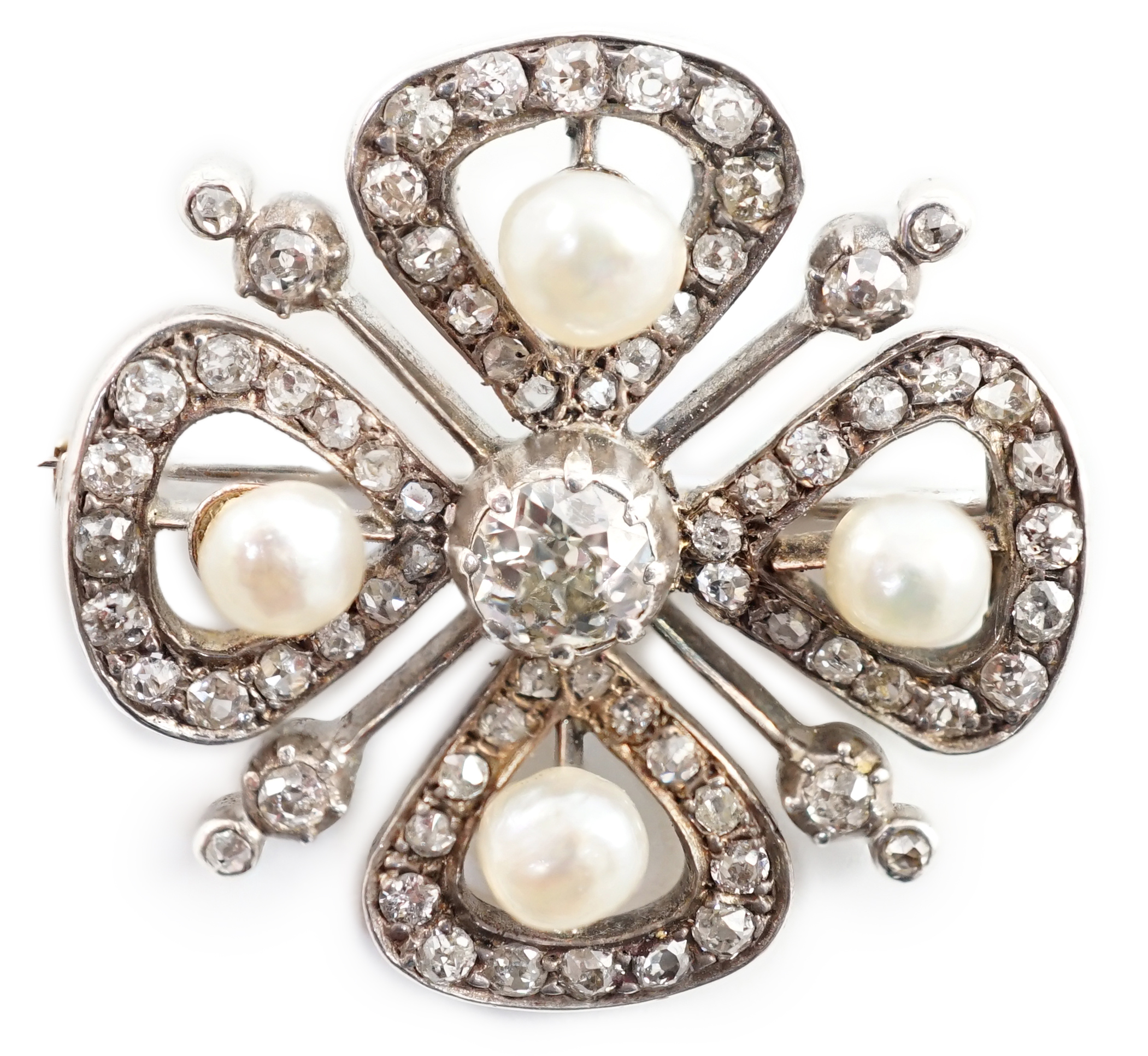 An Edwardian gold and platinum, diamond and four stone button pearl cluster set 'clover' brooch